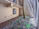 Charming courtyard entrance featuring lush landscaping and a tranquil ambiance at 7500 40Th W Ave # 108, Bradenton, FL 34209