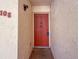 Front door has decorative details, secure entry, and offers a warm welcome to unit 108 at 7500 40Th W Ave # 108, Bradenton, FL 34209