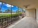 This screened lanai provides an outdoor living space with views of lush landscaping and abundant natural light at 7500 40Th W Ave # 108, Bradenton, FL 34209