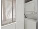 This laundry area features a stacked washer and dryer unit for space-saving convenience at 7500 40Th W Ave # 108, Bradenton, FL 34209