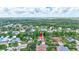 Aerial view of a well-kept home with lush greenery in a tranquil neighborhood at 7705 55Th E St, Ellenton, FL 34222