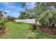 Fenced backyard provides privacy and security, ideal for pets and children to play freely at 7705 55Th E St, Ellenton, FL 34222