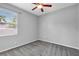This bedroom features neutral walls, plush carpeting and a window providing natural light at 7705 55Th E St, Ellenton, FL 34222