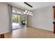 Tile-floored dining area with sliding glass doors to the outdoor patio at 7705 55Th E St, Ellenton, FL 34222
