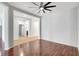 Open-concept living room featuring wood floors and recessed lighting at 7705 55Th E St, Ellenton, FL 34222