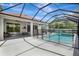 A refreshing pool and spa with screened enclosure provide a private oasis for relaxation and outdoor fun at 7705 55Th E St, Ellenton, FL 34222