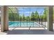 A secluded and screened in pool provides privacy and shade for a tranquil swimming experience at 7705 55Th E St, Ellenton, FL 34222