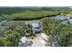 Charming home with a two-car garage surrounded by lush trees and landscaping at 805 Waterside Ln # 805, Bradenton, FL 34209