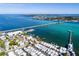 Breathtaking aerial view showcasing the bay, bridges, marina, and waterfront homes, highlighting the coastal lifestyle at 8710 54Th W Ave # 8710, Bradenton, FL 34210