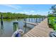 Waterfront property with private dock and boat slips, featuring tranquil water views and coastal charm at 8710 54Th W Ave # 8710, Bradenton, FL 34210