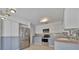 Well-appointed kitchen featuring stainless steel appliances, two-tone cabinetry, and modern lighting at 8710 54Th W Ave # 8710, Bradenton, FL 34210