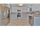 Updated kitchen featuring stainless steel appliances and modern backsplash at 8710 54Th W Ave # 8710, Bradenton, FL 34210