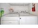 Laundry room with a Whirlpool washing machine and dryer at 8710 54Th W Ave # 8710, Bradenton, FL 34210