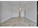 Spacious primary bedroom featuring tile floors, ceiling fan, and ensuite bathroom at 8710 54Th W Ave # 8710, Bradenton, FL 34210