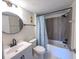 Bathroom featuring new fixtures and granite counters at 970 Virginia St # 109, Dunedin, FL 34698