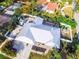 New roof and tropical landscaping are the main features of this home in this aerial view at 1021 Estremadura Dr, Bradenton, FL 34209
