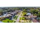 An aerial view of the neighborhood shows homes and pools at 1021 Estremadura Dr, Bradenton, FL 34209