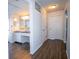 Bright bathroom with updated vanity and fixtures, with wood style floors at 1021 Estremadura Dr, Bradenton, FL 34209