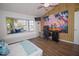 Charming bedroom featuring a bay window with seating and themed decor at 1021 Estremadura Dr, Bradenton, FL 34209