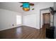 An empty bedroom with wood floors, neutral paint and a ceiling fan at 1021 Estremadura Dr, Bradenton, FL 34209