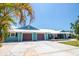Well-maintained single-Gathering home with a spacious driveway and a two-car garage at 1021 Estremadura Dr, Bradenton, FL 34209