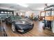 Spacious garage featuring a black sports car and plenty of room for storage and activities at 1021 Estremadura Dr, Bradenton, FL 34209