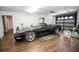 Clean garage with a sleek black sports car, showcasing ample space and practical features at 1021 Estremadura Dr, Bradenton, FL 34209