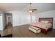 Large main bedroom with wood floors, ensuite bathroom, and walk-in closet at 1021 Estremadura Dr, Bradenton, FL 34209