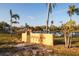 Palma Sola Park signage and landscaping, with views of boats in the marina at 1021 Estremadura Dr, Bradenton, FL 34209