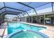 Sparkling pool and spa area offer a refreshing outdoor retreat at 1021 Estremadura Dr, Bradenton, FL 34209