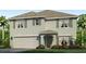 Charming two-story home with a well-manicured lawn and an attached two-car garage at 10841 Gentle Current Way, Parrish, FL 34219