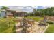 Rear patio area with built in firepit and outdoor seating at 1108 64Th Street E Ct, Bradenton, FL 34208