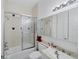 Fun bathroom is themed with Mickey Mouse designs, featuring a tub and shower combination at 1108 64Th Street E Ct, Bradenton, FL 34208