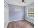 Cozy bedroom features hardwood floors, closet, and natural light at 1108 64Th Street E Ct, Bradenton, FL 34208