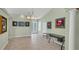 Bright living room features tile flooring, column details, and lots of space at 1108 64Th Street E Ct, Bradenton, FL 34208