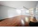 Inviting living room with hardwood floors, neutral paint, and an open view to the entryway at 11717 Wesson E Cir, Tampa, FL 33618