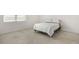 Unfurnished bedroom featuring tiled floors, neutral walls, and a window at 12680 Radiance Ct # 12-101, Venice, FL 34293