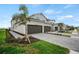 Charming two-story townhomes feature attached garages and landscaped front yards at 12680 Radiance Ct # 12-101, Venice, FL 34293