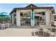 Outdoor seating available at the community restaurant with an open-air bar and tvs at 12680 Radiance Ct # 12-101, Venice, FL 34293