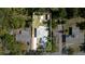 Aerial view of a home surrounded by mature trees and a private backyard at 1345 24Th St, Sarasota, FL 34234