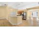 Spacious kitchen with stainless steel appliances, bright countertops, and light wood cabinets at 1399 Shields St, Punta Gorda, FL 33980