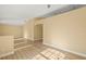 Open-concept living room featuring wood floors, natural light, and neutral wall color at 1399 Shields St, Punta Gorda, FL 33980