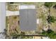 Aerial view of home showcasing the roof, driveway and nearby road at 1533 Olympia Rd, Venice, FL 34293