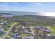 Aerial view of neighborhood, nearby waterway, and Gulf at 1533 Olympia Rd, Venice, FL 34293