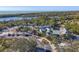 Scenic aerial view of the property and surrounding natural landscape with water and lush greenery at 1533 Olympia Rd, Venice, FL 34293