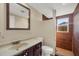Bathroom includes a large vanity, toilet, and custom walk-in shower with tiled surround at 1533 Olympia Rd, Venice, FL 34293