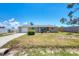 Charming single-story home featuring a well-maintained lawn at 1533 Olympia Rd, Venice, FL 34293