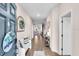 Well lit foyer with view to living areas boasts hard floors and natural light at 16411 62Nd E Gln, Parrish, FL 34219