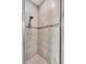The shower includes ceramic tile and glass door at 16411 62Nd E Gln, Parrish, FL 34219