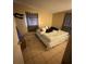 Bedroom featuring tile floors and closet at 1909 6Th W Ave, Palmetto, FL 34221